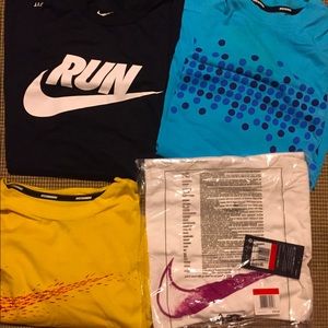 Lot of 4 Nike running shirts